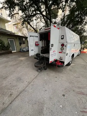 Magnet Plumbing service vehicle on-site for Grease Trap Cleaning in Brogden